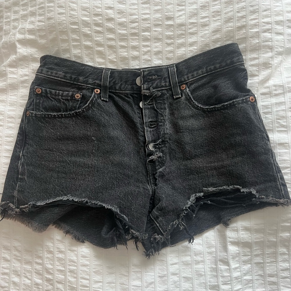 Levi black cut off shorts. Size 26